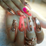 Peachy and gold nail design Swaroski