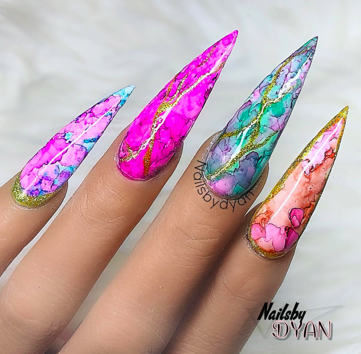 Colorful Marble Stiletto nail design